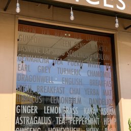 a storefront window with a variety of spices a storefront window with a variety of spices