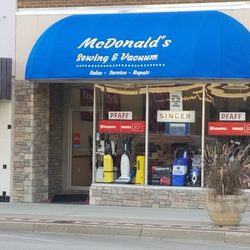 McDonald’s Sewing and Vacuum - The big blue awning in Arkansas City