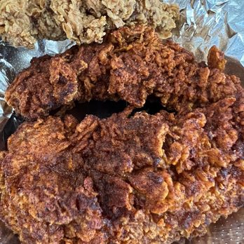 The Red Chickz - Top to bottom: Single chicken tender in Classic, Glow (Mild), and Spark (Medium). - Chicken Shop Near Me - Carlsbad, California The Red Chickz - Top to bottom: Single chicken tender in Classic, Glow (Mild), and Spark (Medium). - Chicken Shop Near Me - Carlsbad, California