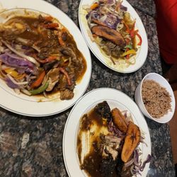 The Path Restaurant & Lounge - Oxtail, curry goat and jerk chicken...waited too long before I took the picture, food was amazing.