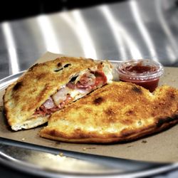 Tonini’s Woodfired Pizzeria - Calzone