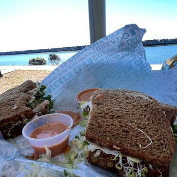 Board & Brew - In the middle of eating California delight with sauce - Sandwiches Near Me - Laguna Niguel, California Board & Brew - In the middle of eating California delight with sauce - Sandwiches Near Me - Laguna Niguel, California