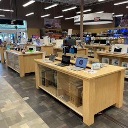 Electronic Express - View of multiple product display tables by the front door of Electronic Express