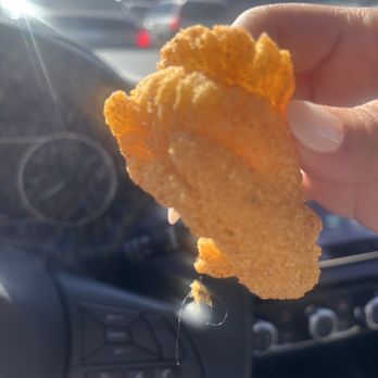 Golden Chick - a hand holding a piece of fried food - Fast Food Near Me - Dallas, Texas Golden Chick - a hand holding a piece of fried food - Fast Food Near Me - Dallas, Texas