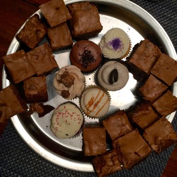 The Cakeroom - Assorted cupcakes flanked by homemade peanut butter cookie-chocolate fudge brownies; message me for my recipe! - Cupcakes Near Me - Washington, DC, District of Columbia