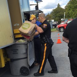 Polar Shredding - Members of the local Police Department assist at our Community Shred Event