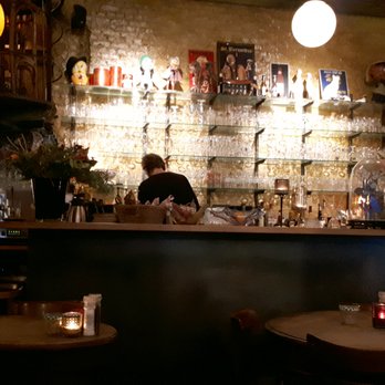 Dansing Chocola - The lovely bar with lots of funny/nice vintage trinkets on top of the shelves. - Belgian Near Me - Antwerp, VAN Dansing Chocola - The lovely bar with lots of funny/nice vintage trinkets on top of the shelves. - Belgian Near Me - Antwerp, VAN