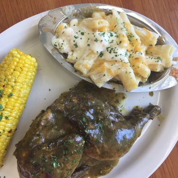 Virgin Island Thyme - Curry Chicken, Roasted corn on the cob and Mac and cheese - Caribbean Near Me - Orlando, Florida Virgin Island Thyme - Curry Chicken, Roasted corn on the cob and Mac and cheese - Caribbean Near Me - Orlando, Florida