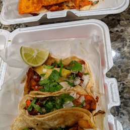 Pastor quesadilla (top) and pastor tacos (bottom) Pastor quesadilla (top) and pastor tacos (bottom)
