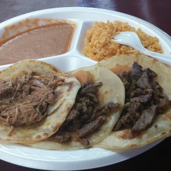 Asadero Toro - Carne Asada (2) and barbacoa (1), side of rice/beans. This is how it arrives at the table. - Mexican Near Me - Phoenix, Arizona Asadero Toro - Carne Asada (2) and barbacoa (1), side of rice/beans. This is how it arrives at the table. - Mexican Near Me - Phoenix, Arizona