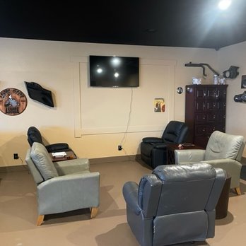 Low Side Cigar Lounge - lounge chairs and a flat screen tv - Cigar Bars Near Me - Pahrump, Nevada