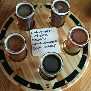 Flathead Lake Brewing Co. Pubhouse - Flight of beer at Flathead Brewery. - American Near Me - Bigfork, Montana