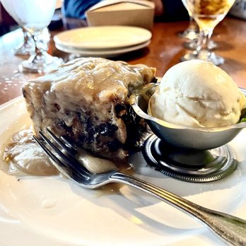 Steakhouse 9 Bistro & Lounge - Dessert menu! Banana chocolate chip bread pudding with a bourbon glaze. - Steakhouses Near Me - Lynden, Washington Steakhouse 9 Bistro & Lounge - Dessert menu! Banana chocolate chip bread pudding with a bourbon glaze. - Steakhouses Near Me - Lynden, Washington