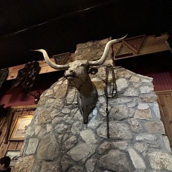 Tejas Steakhouse and Saloon - Steer on the fireplace - Steakhouses Near Me - Bulverde, Texas Tejas Steakhouse and Saloon - Steer on the fireplace - Steakhouses Near Me - Bulverde, Texas