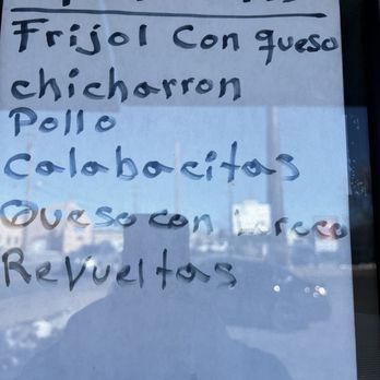 Pupuseria chaleteca - a sign in the window - Food Trucks Near Me - Santa Fe, New Mexico
