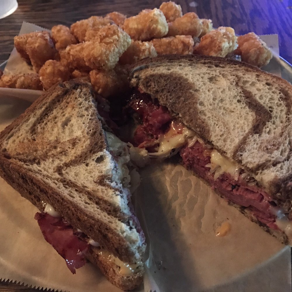 Milltown Arms Tavern - Corned Beef Reuben with tots - Pubs Near Me - Atlanta, Georgia Milltown Arms Tavern - Corned Beef Reuben with tots - Pubs Near Me - Atlanta, Georgia