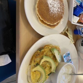 Eggsquisite Cafe - Rockwall - Bacon Omelet comes with two sides. - Breakfast & Brunch Near Me - Rockwall, Texas Eggsquisite Cafe - Rockwall - Bacon Omelet comes with two sides. - Breakfast & Brunch Near Me - Rockwall, Texas