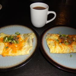 Irma's Place - Two a la cart meat & cheese omelets.