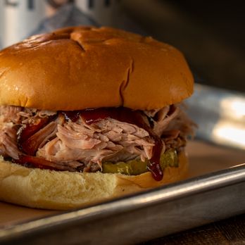 Righteous ‘Que - Pork Sandwich with sauce and pickles - Southern Near Me - Marietta, Georgia Righteous ‘Que - Pork Sandwich with sauce and pickles - Southern Near Me - Marietta, Georgia
