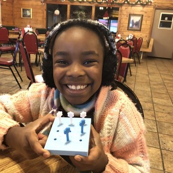 Log Cabin Cafe - Wincate and I enjoying a game of tic tac toe!! - Cafes Near Me - Ringgold, Louisiana