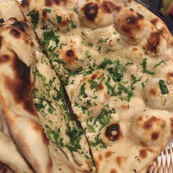 Sacred Spice - Garlic nan. - Indian Near Me - Clearwater, Florida Sacred Spice - Garlic nan. - Indian Near Me - Clearwater, Florida