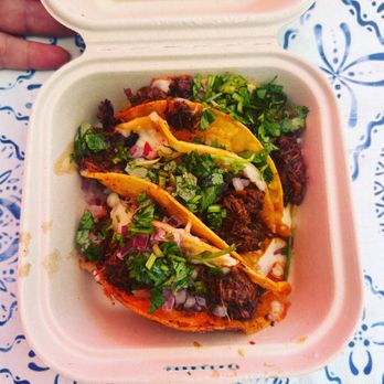 Delicioso also Sabroso - a hand holding a container of tacos - Breakfast & Brunch Near Me - San Ramon, California Delicioso also Sabroso - a hand holding a container of tacos - Breakfast & Brunch Near Me - San Ramon, California