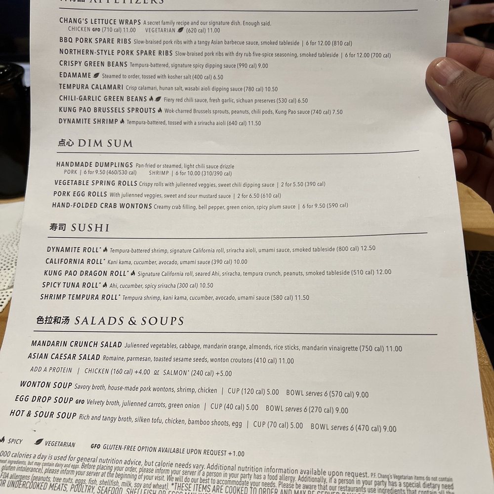 P.F. Chang's - ws a person holding a menu - Chinese Near Me - Dayton, Ohio P.F. Chang's - ws a person holding a menu - Chinese Near Me - Dayton, Ohio