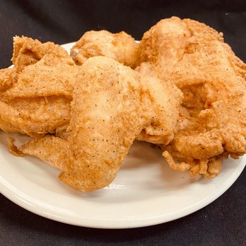 Dano's Pizza - fried chicken on a white plate - Pizza Near Me - Hartfield, Virginia