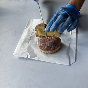 Bread Ahead Bakery | Borough Market - Pistachio donut cut in half - Bakeries Near Me - London, XGL Bread Ahead Bakery | Borough Market - Pistachio donut cut in half - Bakeries Near Me - London, XGL