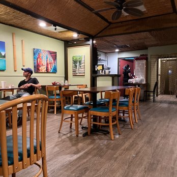 Thai Thai Restaurant - a man sitting at a table - Thai Near Me - Dallas, Texas Thai Thai Restaurant - a man sitting at a table - Thai Near Me - Dallas, Texas