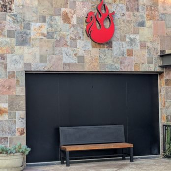 Fire Wings - Bench under the Fire Wings logo - Chicken Wings Near Me - Long Beach, California Fire Wings - Bench under the Fire Wings logo - Chicken Wings Near Me - Long Beach, California