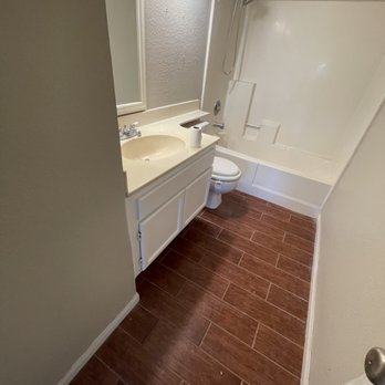 De la Rosa Painting - Repaired water damage and refinished the guest bathroom built- in-cabinet. - Refinishing Services Near Me
