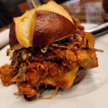 Primeburger - Oink, Squeal, & Moo, patty, pulled pork, bacon, cheddar, onion straws, BBQ, Mayo on a pretzel bun - Burgers Near Me - Las Vegas, Nevada Primeburger - Oink, Squeal, & Moo, patty, pulled pork, bacon, cheddar, onion straws, BBQ, Mayo on a pretzel bun - Burgers Near Me - Las Vegas, Nevada