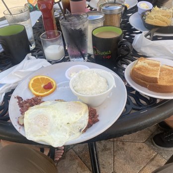 Sage Biscuit Cafe - Corned Beef Hash and eggs with grits and a side of bacon - Breakfast & Brunch Near Me - Bradenton, Florida