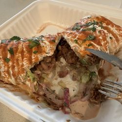 Tacos Libertad - Burrito xtra veg - sliced open.