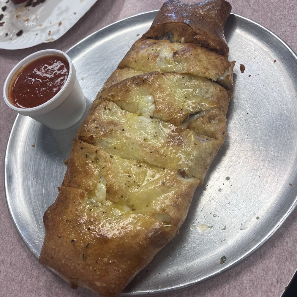 Devil's NY Pizzeria & Restaurant - NY Sausage Stromboli - Pizza Near Me - Durham, North Carolina Devil's NY Pizzeria & Restaurant - NY Sausage Stromboli - Pizza Near Me - Durham, North Carolina