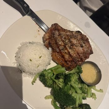 Bonefish Grill - Bone-In 12oz Pork Chop with broccoli and jasmine rice - Seafood Near Me - Indianapolis, Indiana