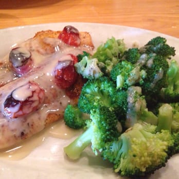Romacelli Restaurant & Bar - Oven roasted tilapia with broccoli. The cherry tomatoes really gave it something extra! Always one of my favorites! - Italian Near Me - Lafayette, Louisiana Romacelli Restaurant & Bar - Oven roasted tilapia with broccoli. The cherry tomatoes really gave it something extra! Always one of my favorites! - Italian Near Me - Lafayette, Louisiana