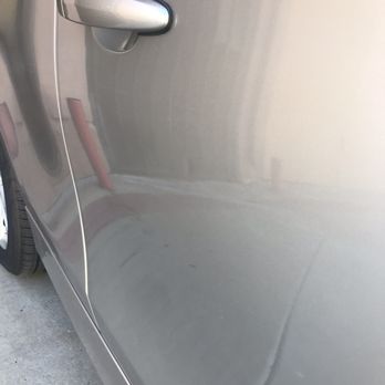 Lux Paintless Dent Removal - Dimple #2 - before (barely noticeable but if you look hard you can see it) - Body Shops Near Me