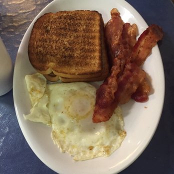 Walt's Restaurant - Yer basic egg/toast/bacon. We asked for un-cut bread so kiddo could make a sandwich. - American Near Me - Caseville, Michigan Walt's Restaurant - Yer basic egg/toast/bacon. We asked for un-cut bread so kiddo could make a sandwich. - American Near Me - Caseville, Michigan