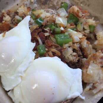 Water's Edge Restaurant - Short rib hash with poached eggs - Cafes Near Me - Oak Brook, Illinois Water's Edge Restaurant - Short rib hash with poached eggs - Cafes Near Me - Oak Brook, Illinois