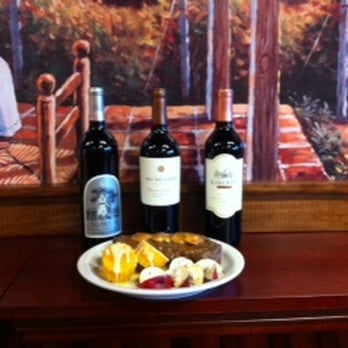 The Wine Cellar - three bottles of wine and a plate of fruit - Beer, Wine & Spirits Near Me - Olive Branch, Mississippi The Wine Cellar - three bottles of wine and a plate of fruit - Beer, Wine & Spirits Near Me - Olive Branch, Mississippi