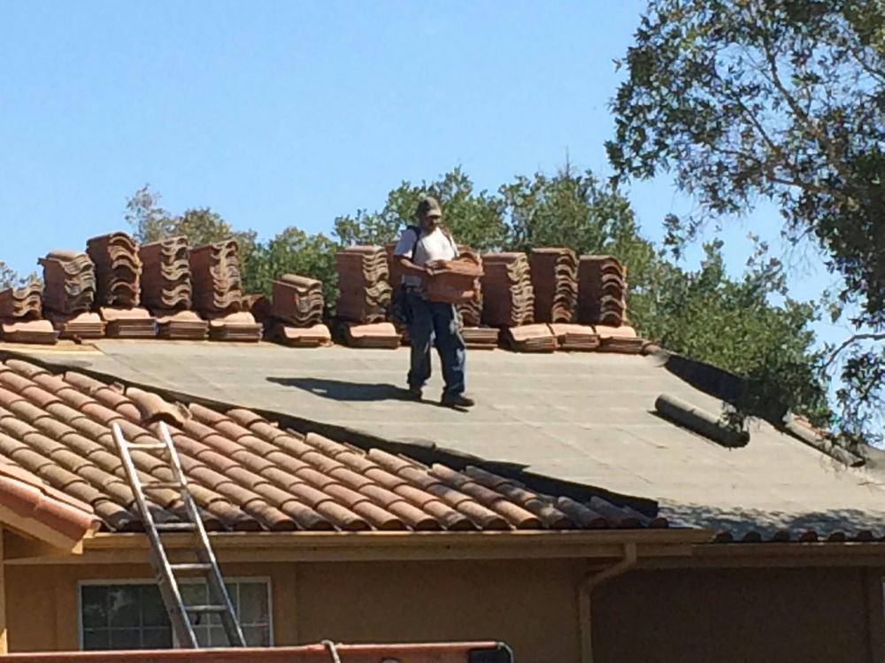 Slide of Eddies Roofing