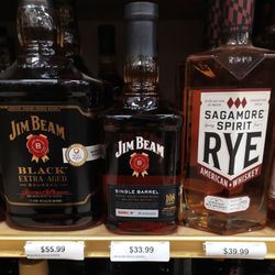 Tomar's Discount Liquor - That baby in the middle