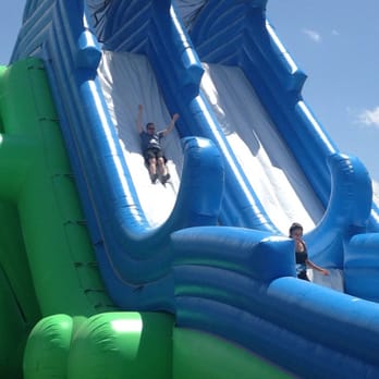 El Paso Insane Inflatable 5K - Jason sliding to the finish - Local Flavor Near Me - Anthony, New Mexico