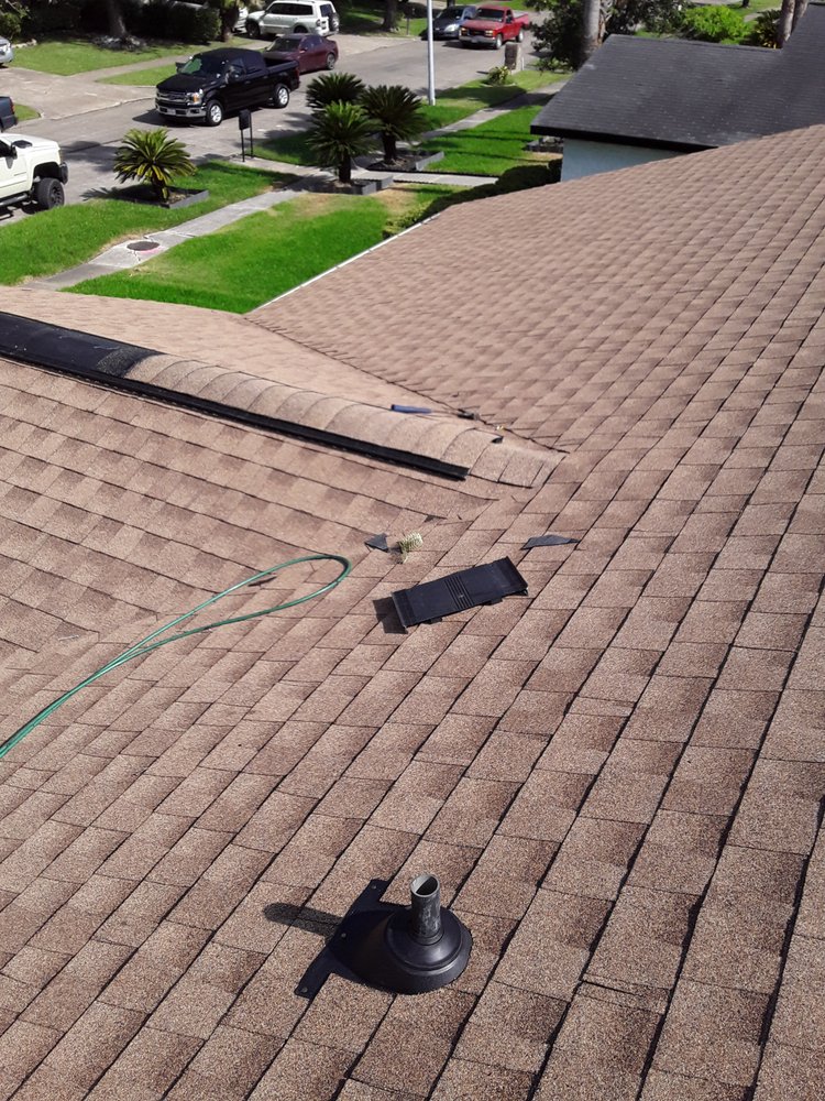 Slide of LMM Roofing