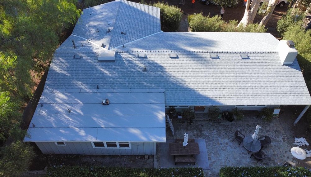 Slide of Shield Roofing