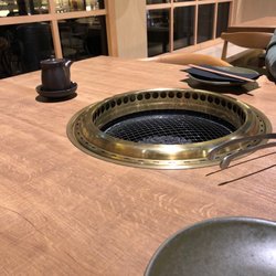 Touka Japanese - Grill in the center of the table