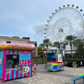 Freeze Your Brain Shave Ice - a ferris wheel in the background - Shaved Ice Near Me - Orlando, Florida Freeze Your Brain Shave Ice - a ferris wheel in the background - Shaved Ice Near Me - Orlando, Florida