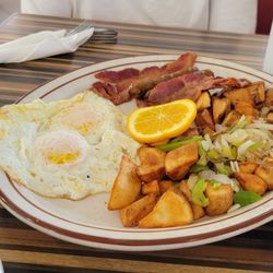 Tom's Famous Family Restaurant - Tried NEW Totally Tom's breakfast  there 3 small pancakes and biscuit with gravy too!!! For two of us! Yummy